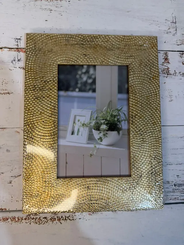 Portaretrato dorado 15x21 cm